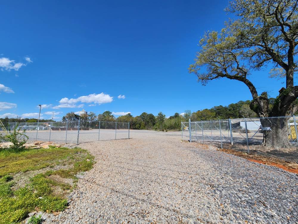 Fenced gravel laydown yard at 88 Telegraph Road